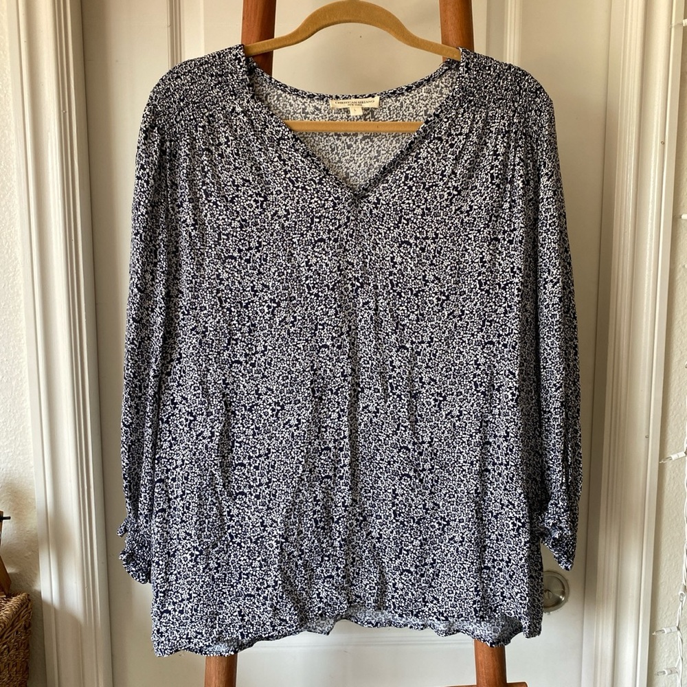 Blue and white floral blouse